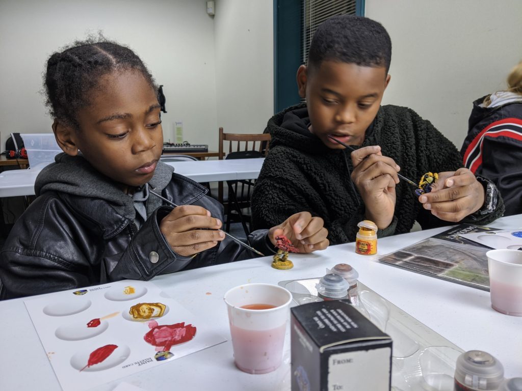 Kids Painting RPG Miniatures