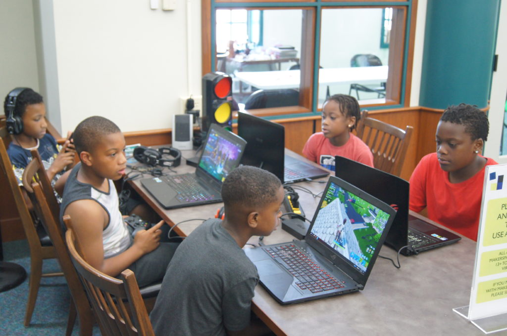 Photo of Kids Playing video games